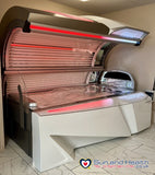 Silver Luxura Vegaz 8200 commercial  lie down sunbed installed in a tanning salon
